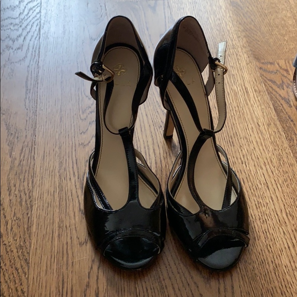 Isola black patent heels